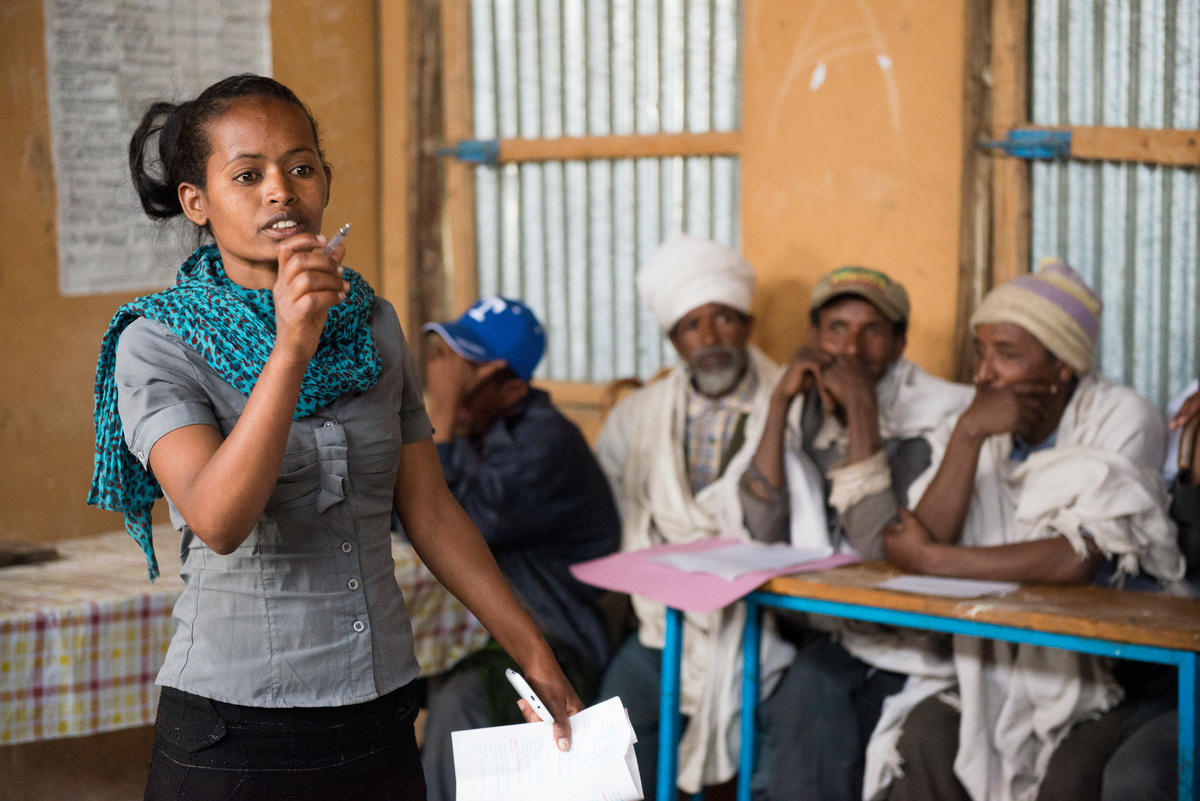 photo of a woman speaking to a group