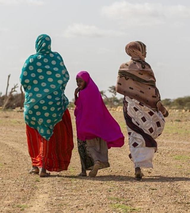 photo of women walking