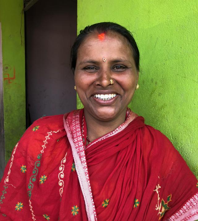 Smiles from a successful woman latrine sales agent in the Terai, Nepal.