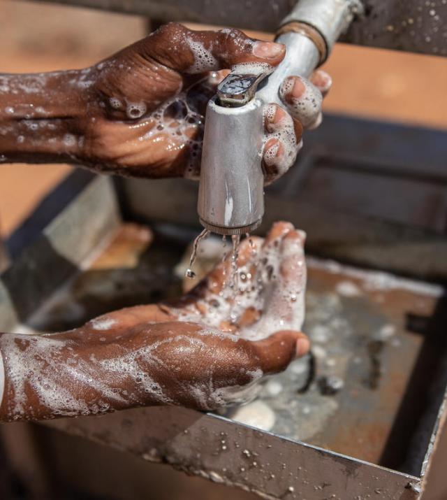 A person is washing hands