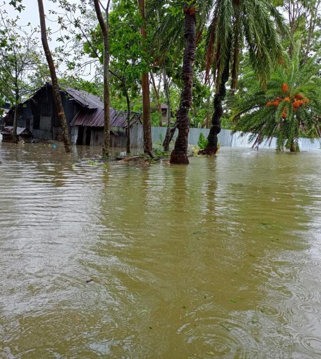 Houses flooded with rainwater in Bangladesh.