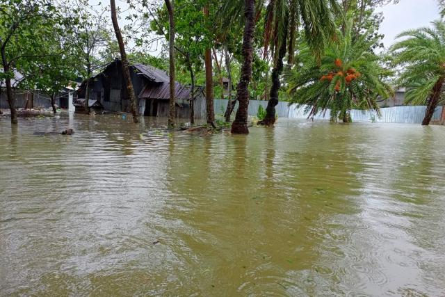 Houses flooded with rainwater in Bangladesh.